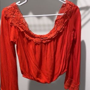 red long sleeve off the shoulder